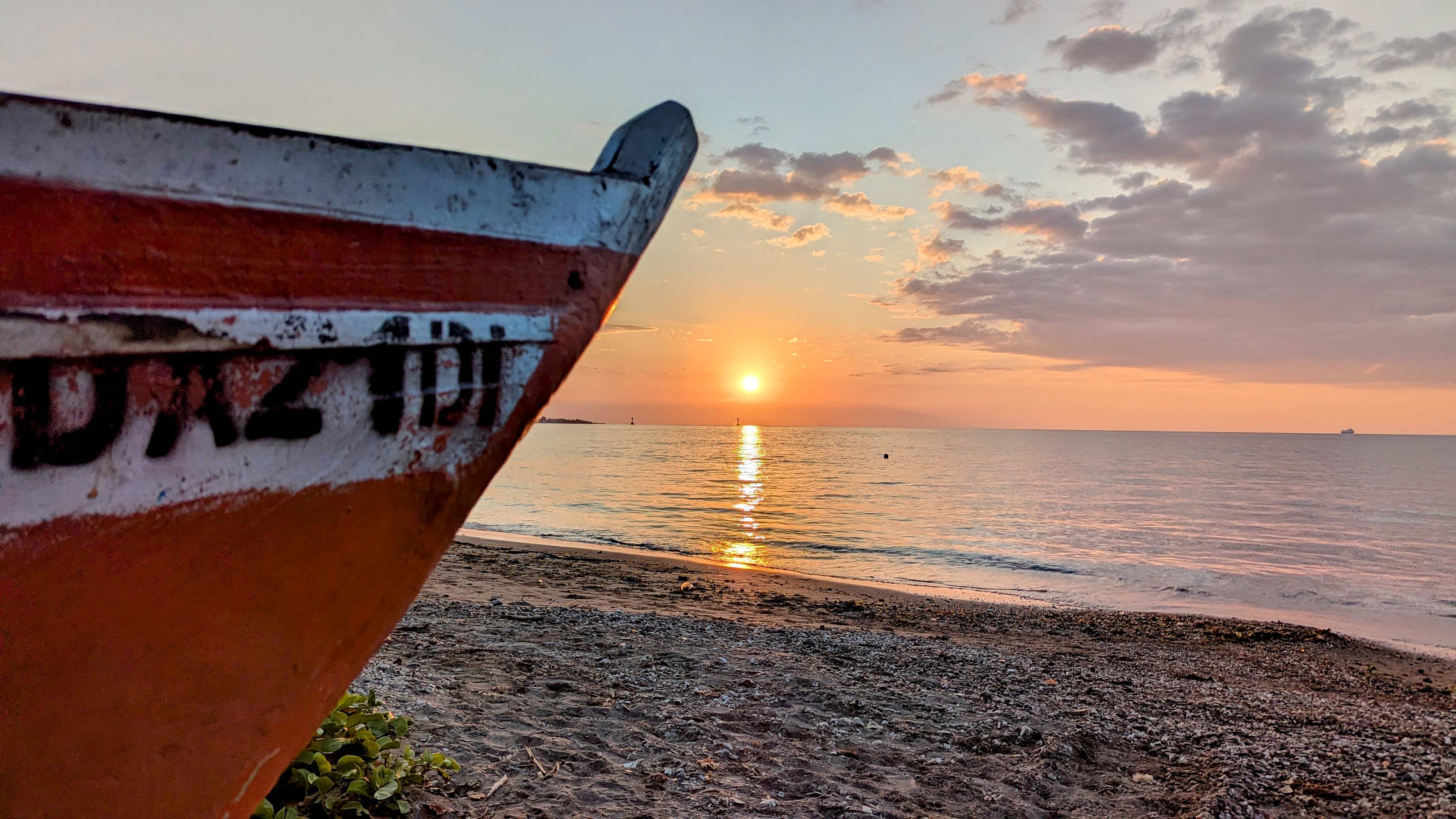 dili boat at sunset